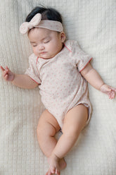 Baby Sleeping Comfortably in Avauma Soft Rose Cocoa Short Sleeve Bodysuit, Soft Cotton Babywear